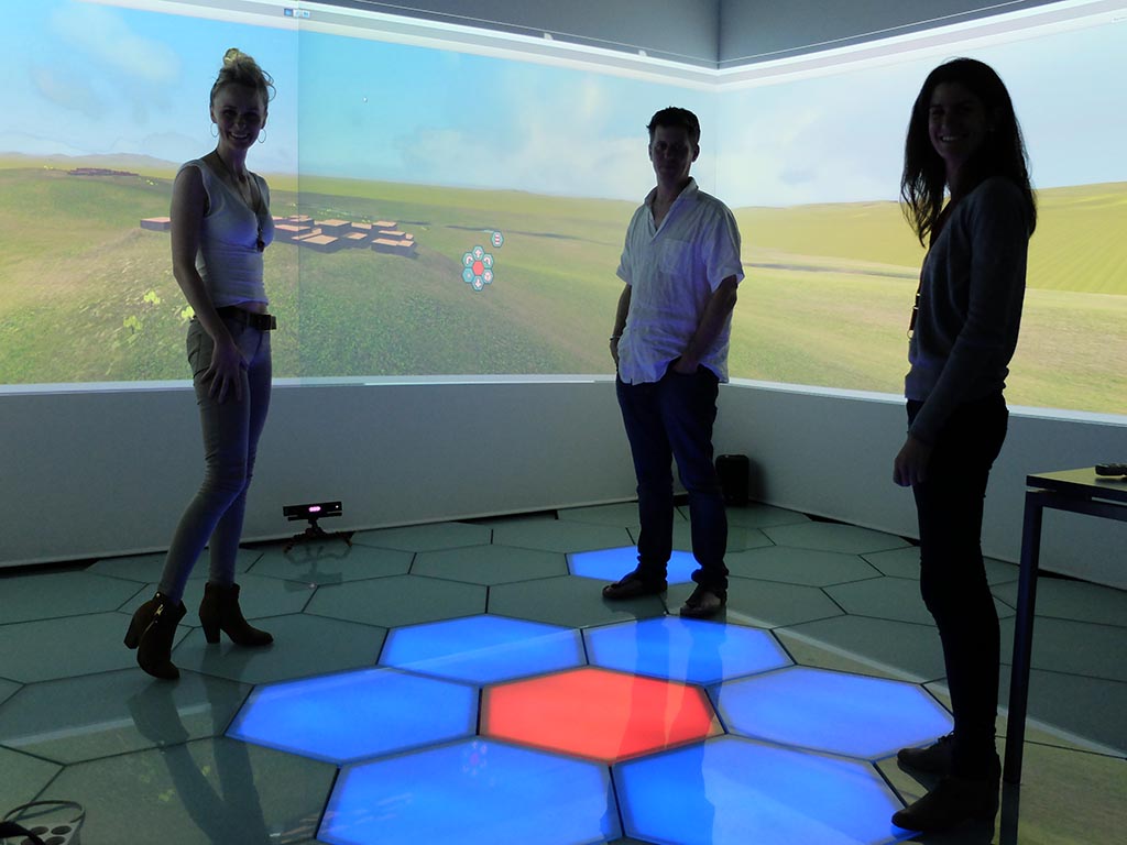 Sara Perry, James Taylor and Laura Serra at the mixed reality space of the SPECS Lab.
