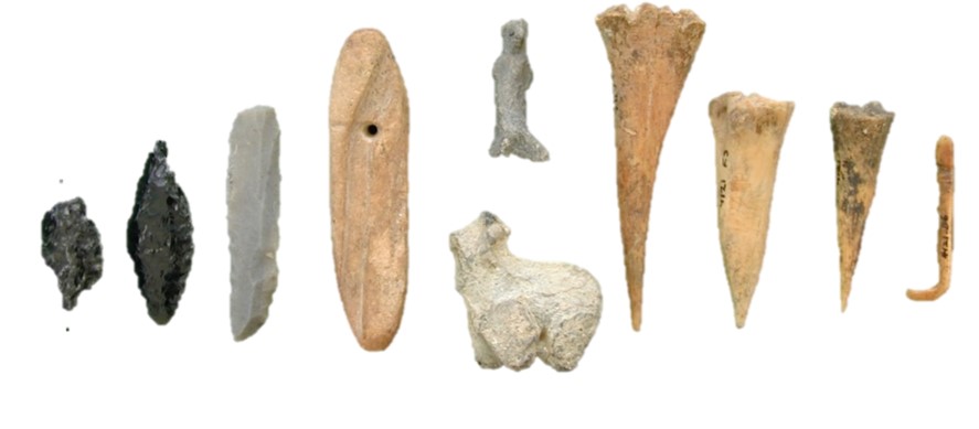 An assortment of the artefacts found at Çatalhöyük including obsidian, bone tools and clay figurines.