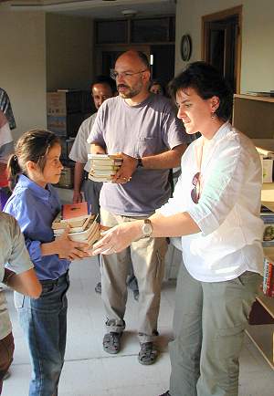 Figure 19: Handing over the books